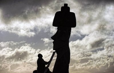 Workers repair a moais -- stone statues of the Rapa Nui culture -- on Easter Island, some 3,700 km off the Chilean coast in the Pacific Ocean. AFP Workers repair a moais -- stone statues of the Rapa Nui culture -- on Easter Island, some 3,700 km off the Chilean coast in the Pacific Ocean. AFP