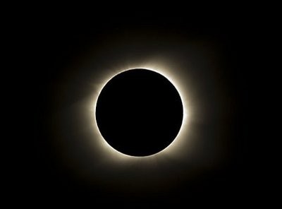 The sun is seen partially covered by the moon on Easter Island, 3700 km off the Chilean coast in the Pacific Ocean. The sun is seen partially covered by the moon on Easter Island, 3700 km off the Chilean coast in the Pacific Ocean.