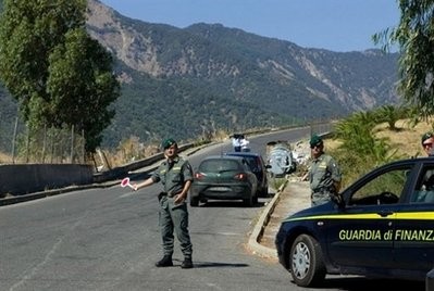 File photo shows Italian police conducting a roadblock in the southern region of Calabria. AFP file File photo shows Italian police conducting a roadblock in the southern region of Calabria. AFP file