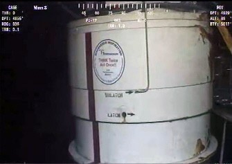 This still image from a live BP video feed shows the closeup of the sealing cap over a gushing well in the Gulf of Mexico on July 10, 2010. AFP This still image from a live BP video feed shows the closeup of the sealing cap over a gushing well in the Gulf of Mexico on July 10, 2010. AFP