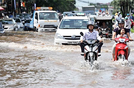 The Lieu Giai Street remained flooded for several hours after the heavy rains in Hanoi July 13. The Lieu Giai Street remained flooded for several hours after the heavy rains in Hanoi July 13.