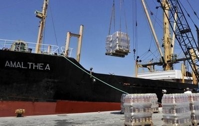 Crates are loaded onto the cargo ship Amalthea at the Greek port of Lavrio on July 9. AFP Crates are loaded onto the cargo ship Amalthea at the Greek port of Lavrio on July 9. AFP