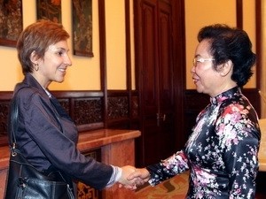 Vice State President Nguyen Thi Doan (R) receives Joanna Derobah Kerr, General Director of Action Aid In Hanoi on July 16( Photo: VietnamPlus) Vice State President Nguyen Thi Doan (R) receives Joanna Derobah Kerr, General Director of Action Aid In Hanoi on July 16( Photo: VietnamPlus)