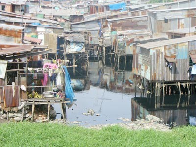 Slums of the U Cay Canal (Photo: U. Phuong ) Slums of the U Cay Canal (Photo: U. Phuong )