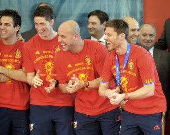 Cesc Fabregas, Fernando Torres, Pepe Reina and Xabi Alonso of Spain laugh during a reception with Spain's Prime Minister Jose Luis Rodriguez Zapatero at the Moncloa Palace on July 12, 2010 in Madrid, a day after winning the World Cup for the first time. AFP Cesc Fabregas, Fernando Torres, Pepe Reina and Xabi Alonso of Spain laugh during a reception with Spain's Prime Minister Jose Luis Rodriguez Zapatero at the Moncloa Palace on July 12, 2010 in Madrid, a day after winning the World Cup for the first time. AFP