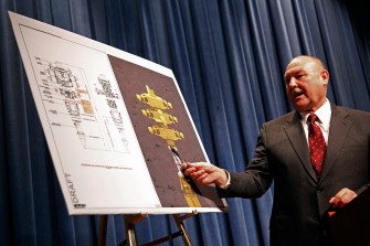 Thad Allen points to an illustration of the well cap stack and where leaks have been spotted during a news conference at the Department of Health and Human Services July 19, 2010 in Washington, DC. AFP Thad Allen points to an illustration of the well cap stack and where leaks have been spotted during a news conference at the Department of Health and Human Services July 19, 2010 in Washington, DC. AFP