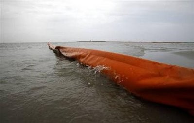 Oil booms are seen in Breton Island, Louisiana, as oil leaking from the Deepwater Horizon wellhead continues to spread in the Gulf of Mexico in this May 3, 2010 file photo
