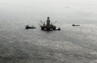 Oil sheen is seen with vessels assisting near the source of the BP Deepwater Horizon oil spill on July 23 in the Gulf of Mexico Oil sheen is seen with vessels assisting near the source of the BP Deepwater Horizon oil spill on July 23 in the Gulf of Mexico