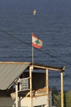 In this photo taken Friday, July 23, 2010, a buoy placed but Israel near the Lebanon-Israel water border, that wasn't recognized by lebanon and the U.N., seen in front of a center for Lebanese general security in the southern coastal town of Naqoura, Lebanon. In this photo taken Friday, July 23, 2010, a buoy placed but Israel near the Lebanon-Israel water border, that wasn't recognized by lebanon and the U.N., seen in front of a center for Lebanese general security in the southern coastal town of Naqoura, Lebanon.