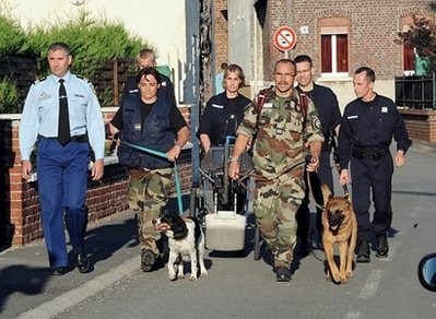 French forsenic policemen arrive in front of the house in Villers-au-Tertre, northern France, where the bodies of eight new-born babies were found, on July 28. French forsenic policemen arrive in front of the house in Villers-au-Tertre, northern France, where the bodies of eight new-born babies were found, on July 28.