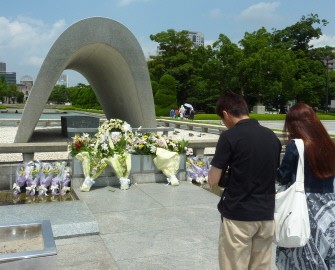 A Japanese couple prays before the altar for victims of the 1945 atomic bombing at Hiroshima's Peace Memorial Park in western Japan on August 1, 2010. AFP A Japanese couple prays before the altar for victims of the 1945 atomic bombing at Hiroshima's Peace Memorial Park in western Japan on August 1, 2010. AFP