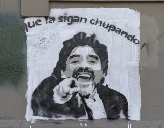 View of a graffiti depicting former Argentina's national football team coach Diego Maradona in a wall in Mendoza, Argentina on July 31, 2010. AFP PHOTO View of a graffiti depicting former Argentina's national football team coach Diego Maradona in a wall in Mendoza, Argentina on July 31, 2010. AFP PHOTO