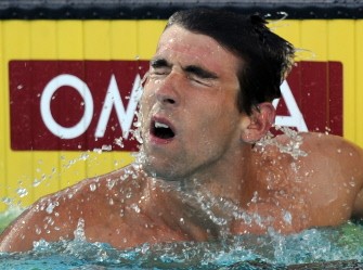 Michael Phelps reacts to a first place finish in the Men 100 LC Meter Butterfly Final at the William Woollett Jr. Aquatics Complex on August 5, 2010 in Irvine, California. AFP Michael Phelps reacts to a first place finish in the Men 100 LC Meter Butterfly Final at the William Woollett Jr. Aquatics Complex on August 5, 2010 in Irvine, California. AFP