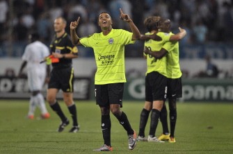 Caen's Youssef El Arabi (C) celebrates at the end of the match Marseille versus Caen. AFP Caen's Youssef El Arabi (C) celebrates at the end of the match Marseille versus Caen. AFP