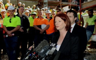 Australian Prime Minister Julia Gillard (R) speaks at a media conference during a visit to a construction site in inner-west Sydney on August 13, 2010. AFP Australian Prime Minister Julia Gillard (R) speaks at a media conference during a visit to a construction site in inner-west Sydney on August 13, 2010. AFP