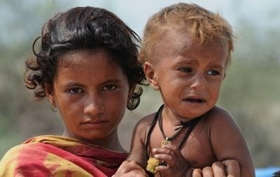 Flood-affected Pakistanis are seen in Bassera village on August 18, 2010 Flood-affected Pakistanis are seen in Bassera village on August 18, 2010