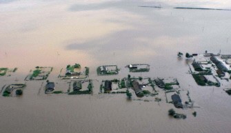 This picture released by North Korea's Central News Agency on August 21 and distributed by Tokyo's Korean News Service shows houses submerged in floodwaters near the Sinuiju area in North Pyongan province near the northern border with China formed by the Yalu river. AFP This picture released by North Korea's Central News Agency on August 21 and distributed by Tokyo's Korean News Service shows houses submerged in floodwaters near the Sinuiju area in North Pyongan province near the northern border with China formed by the Yalu river. AFP