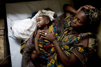 (AFP FILES) A picture taken on November 13, 2008 shows a woman caring for her child suffering from cholera at the General Hospital of the provincial capital city of Goma, Congo. (AFP FILES) A picture taken on November 13, 2008 shows a woman caring for her child suffering from cholera at the General Hospital of the provincial capital city of Goma, Congo.