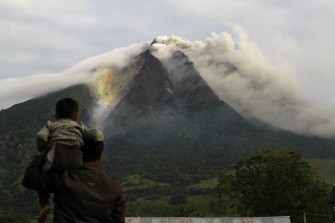 The Sinabung volcano spews thick smoke in Karo district in North Sumatra on August 29, 2010. AFP The Sinabung volcano spews thick smoke in Karo district in North Sumatra on August 29, 2010. AFP