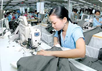 Workers at Saigon 3 Garment JSC in HCM City (Photo: SGGP) Workers at Saigon 3 Garment JSC in HCM City (Photo: SGGP)