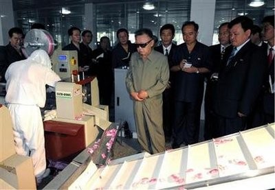 North Korean leader Kim Jong-il (C) visits the Pyongyang Cornstarch Factory in this undated picture released on August 26, 2010 by North Korea's KCNA news agency North Korean leader Kim Jong-il (C) visits the Pyongyang Cornstarch Factory in this undated picture released on August 26, 2010 by North Korea's KCNA news agency