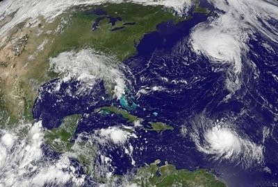 A National Oceanic and Atmospheric Administration satellite image shows Hurricane Danielle (Top-R) and Hurricane Earl (Bottom-R) churning in the Atlantic Ocean. A National Oceanic and Atmospheric Administration satellite image shows Hurricane Danielle (Top-R) and Hurricane Earl (Bottom-R) churning in the Atlantic Ocean.