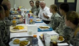 US Secretary of Defense Robert Gates (4th R) has dinner with troops at the Sports Oasis dining facility at Camp Victory in Baghdad, on September 1, 2010. AFP US Secretary of Defense Robert Gates (4th R) has dinner with troops at the Sports Oasis dining facility at Camp Victory in Baghdad, on September 1, 2010. AFP