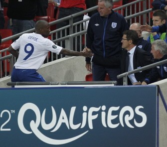 England's Manager Fabio Capello (R) shakes hands with Defoe after he is substituted against Bulgaria during the match. AFP England's Manager Fabio Capello (R) shakes hands with Defoe after he is substituted against Bulgaria during the match. AFP