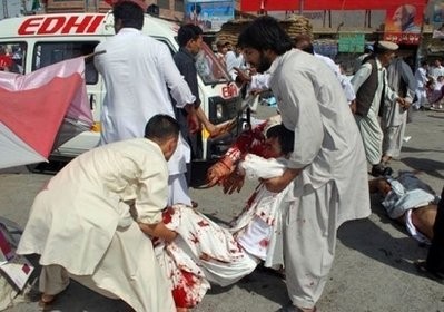 (AFP file) Pakistani men help injured blast victims at the site of a suicide bomb attack in Quetta. (AFP file) Pakistani men help injured blast victims at the site of a suicide bomb attack in Quetta.