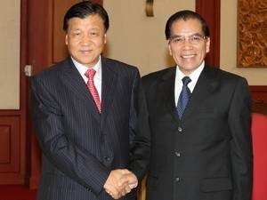General Secretary Nong Duc Manh (right) receives Chinese Politburo member Liu Yunshan. General Secretary Nong Duc Manh (right) receives Chinese Politburo member Liu Yunshan.