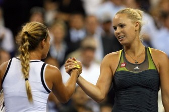 Wozniacki shakes hands with Cibulkova after their women's single quarterfinal match on September 8, 2010. AFP Wozniacki shakes hands with Cibulkova after their women's single quarterfinal match on September 8, 2010. AFP