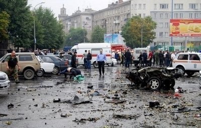 Investigators examine the site of a blast near a market in Vladikavkaz Investigators examine the site of a blast near a market in Vladikavkaz