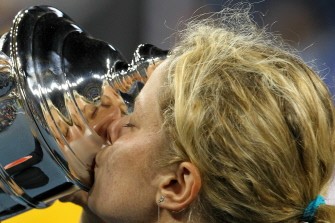 Kim Clijsters kisses with her US Open trophy on Sep. 11. AFP Kim Clijsters kisses with her US Open trophy on Sep. 11. AFP