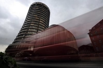 A car passes by the Bank for International Settlements (BRI) in Basel. A car passes by the Bank for International Settlements (BRI) in Basel.