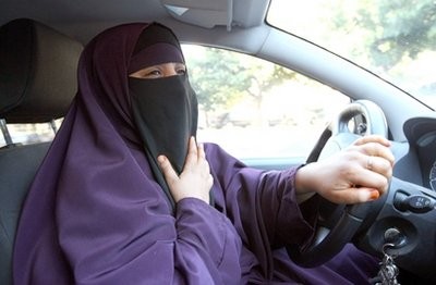 France's Kenza Drider , wearing a niqab, drives a car in Avignon, southern France, Monday, Sept. 13, 2010. France's Kenza Drider , wearing a niqab, drives a car in Avignon, southern France, Monday, Sept. 13, 2010.