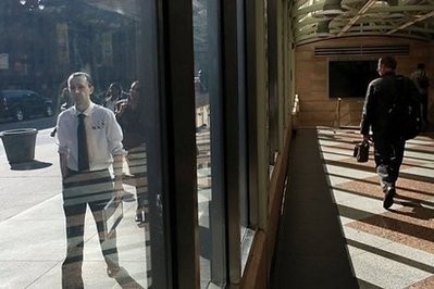 (AFP file) People seeking work wait outside a job fair in New York. (AFP file) People seeking work wait outside a job fair in New York.