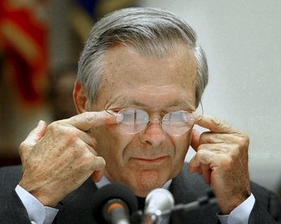 In this May 7, 2004 file photo, then-Defense Secretary Donald H. Rumsfeld rubs his eyes while testifying about Abu Ghraib prison before the House Armed Services Committee on Capitol Hill in Washington In this May 7, 2004 file photo, then-Defense Secretary Donald H. Rumsfeld rubs his eyes while testifying about Abu Ghraib prison before the House Armed Services Committee on Capitol Hill in Washington