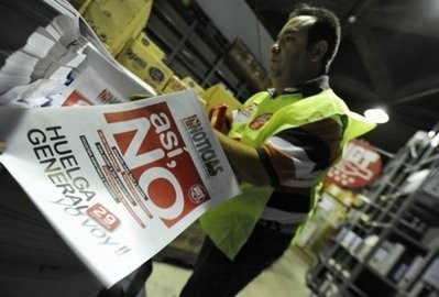 A member of UGT (General Union of Workers) checks flyers, placards and posters at UGT Headquarters in Madrid on the eve of a general strike. AFP A member of UGT (General Union of Workers) checks flyers, placards and posters at UGT Headquarters in Madrid on the eve of a general strike. AFP