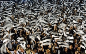 Partizan Belgrade fans wave their team's flag during a Champions League match against Arsenal at the Partizan Stadium in Belgrade on September 28, 2010. AFP Partizan Belgrade fans wave their team's flag during a Champions League match against Arsenal at the Partizan Stadium in Belgrade on September 28, 2010. AFP