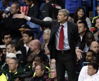 Arsene Wenger gestures during the match against Chelsea at Stamford Bridge on October 3, 2010. AFP Arsene Wenger gestures during the match against Chelsea at Stamford Bridge on October 3, 2010. AFP