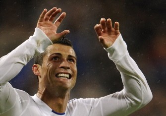 Cristiano Ronaldo celebrates after scoring during the match Real Madrid against Deportivo Coruna on October 3, 2010. Real Madrid won 6-1. AFP Cristiano Ronaldo celebrates after scoring during the match Real Madrid against Deportivo Coruna on October 3, 2010. Real Madrid won 6-1. AFP