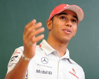 British Formula One driver Lewis Hamilton of McLaren Mercedes speaks with pupils of the John Lennon school in Berlin on September 28, 2010. AFP British Formula One driver Lewis Hamilton of McLaren Mercedes speaks with pupils of the John Lennon school in Berlin on September 28, 2010. AFP