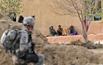 AFP/File – A US soldier takes position as an Afghan family watch him from their home in Paktika province AFP/File – A US soldier takes position as an Afghan family watch him from their home in Paktika province