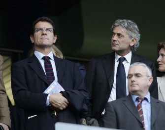 Fabio Capello, Manager of England (L) and assistant Franco Baldini attend the match between Chelsea and Arsenal during a Premier League match at Stamford Bridge in London, on October 3, 2010. AFP Fabio Capello, Manager of England (L) and assistant Franco Baldini attend the match between Chelsea and Arsenal during a Premier League match at Stamford Bridge in London, on October 3, 2010. AFP
