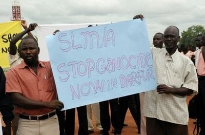 Southern Sudanese men wait for the arrival of envoys from the UN Security Council at the southern Sudanese capital Juba. Southern Sudanese men wait for the arrival of envoys from the UN Security Council at the southern Sudanese capital Juba.