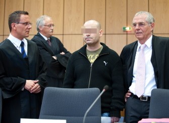 Defendant Nurellin G. (2ndR) stands among his lawyers (L-R) Joe Therond, Hans Geisler and Jens Meggers in the Regional Court at the start of the trial in Bochum October 6, 2010. AFP Defendant Nurellin G. (2ndR) stands among his lawyers (L-R) Joe Therond, Hans Geisler and Jens Meggers in the Regional Court at the start of the trial in Bochum October 6, 2010. AFP