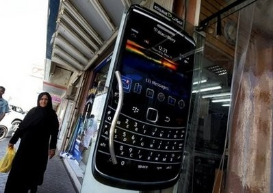 A woman walks past a BlackBerry smart phone advertisement in Dubai. AFP A woman walks past a BlackBerry smart phone advertisement in Dubai. AFP