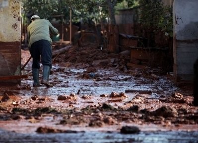A local man cleans yard in the flooded town of Devecser on October 8. AFP A local man cleans yard in the flooded town of Devecser on October 8. AFP
