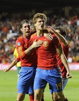 Spain's forward Fernando Llorente (centre) and Sergio Ramos (left) celebrate after scoring during the Euro 2012 Group I qualifying round match vs Lithuania, on October 8. AFP Spain's forward Fernando Llorente (centre) and Sergio Ramos (left) celebrate after scoring during the Euro 2012 Group I qualifying round match vs Lithuania, on October 8. AFP
