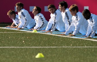 Players of the German national football team stretch during a training session in a training centre in Berlin, on October 10, 2010. German will face Kazakhstan in Astana, October 12, 2010. AFP Players of the German national football team stretch during a training session in a training centre in Berlin, on October 10, 2010. German will face Kazakhstan in Astana, October 12, 2010. AFP